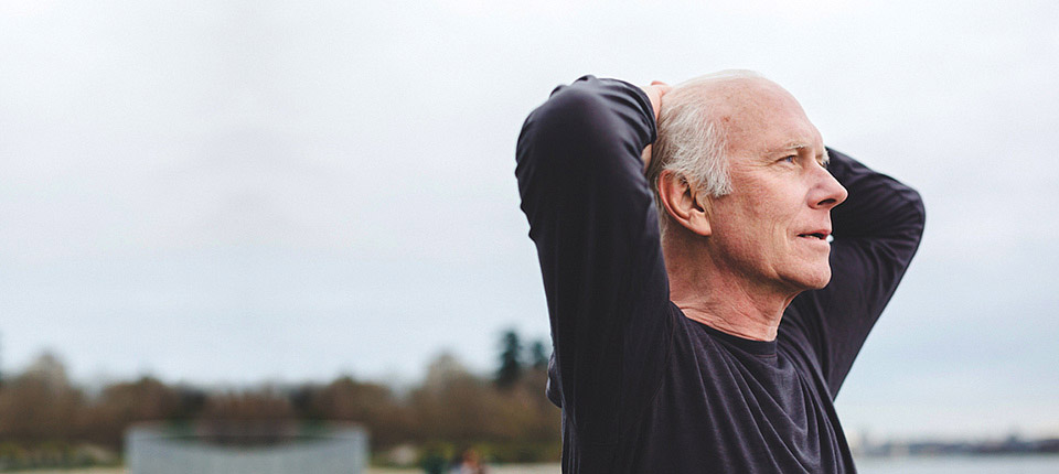 Tired senior man breathing after exercise workout